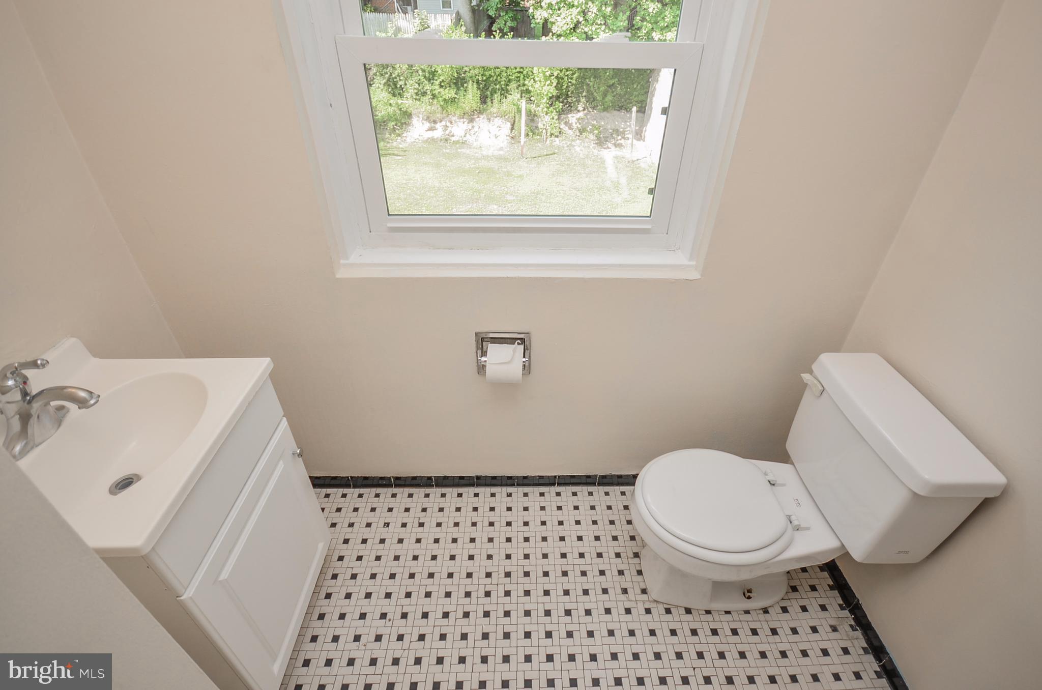 11714 Veirs Mill Road Silver Spring, MD 20902 - Photo 14 of 28 Upper Level Powder Room