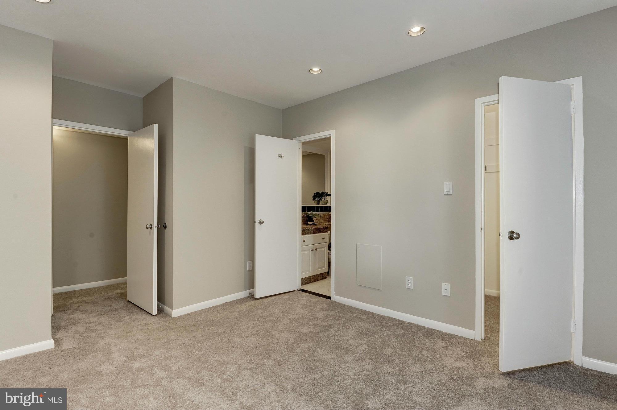 11649 Stoneview Square, Unit 22C Reston, VA 20191 - Photo 14 of 30 Large Master Bedroom with en suite Bath