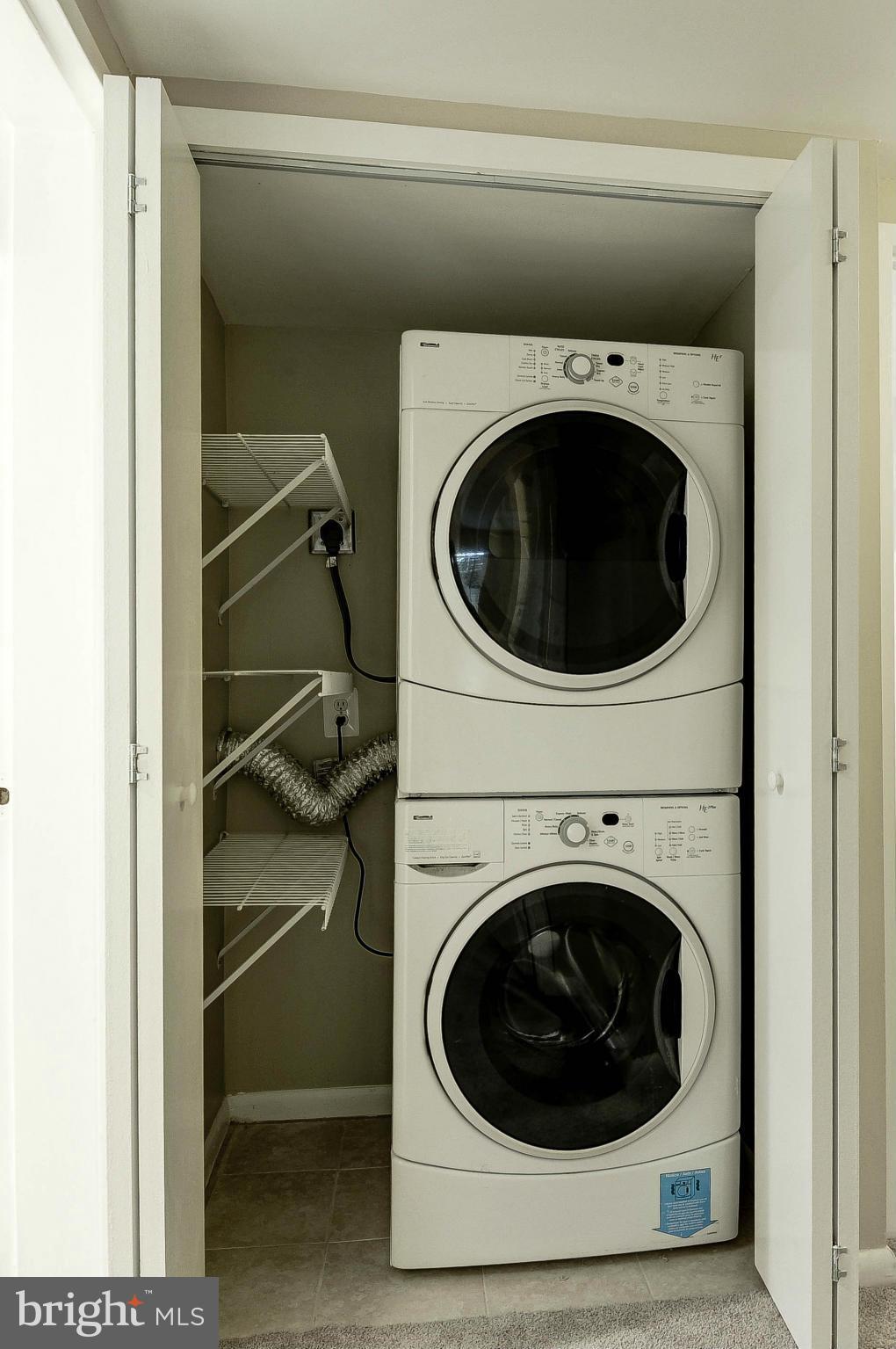 11649 Stoneview Square, Unit 22C Reston, VA 20191 - Photo 20 of 30 Laundry area with Bi-fold Doors