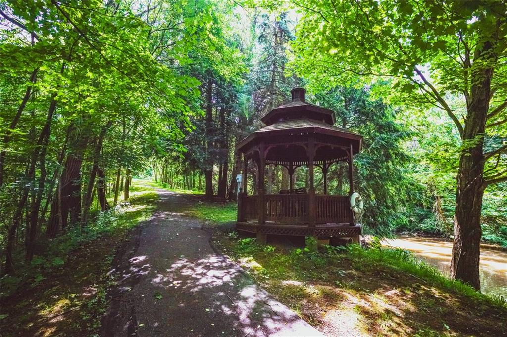 949 Meadowbrook Road Trafford, PA 15085 - Photo 21 of 22 Gazebo with glider swing overlooking the pond.
