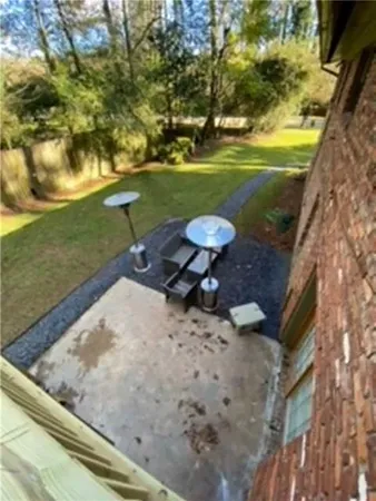a view of a lake with a yard