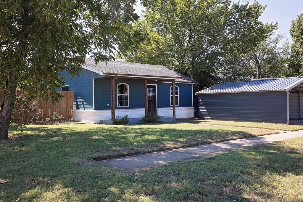 1214 3rd Street Graham, TX 76450 - Photo 4 of 23 a backyard of a house with barbeque oven