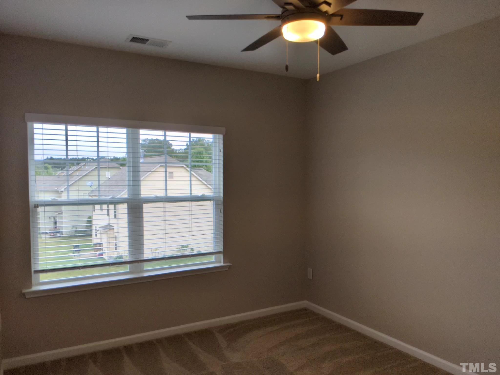 1976 Austin Ridge Parkway Wake Forest, NC 27587 - Photo 18 of 21 an empty room with a window