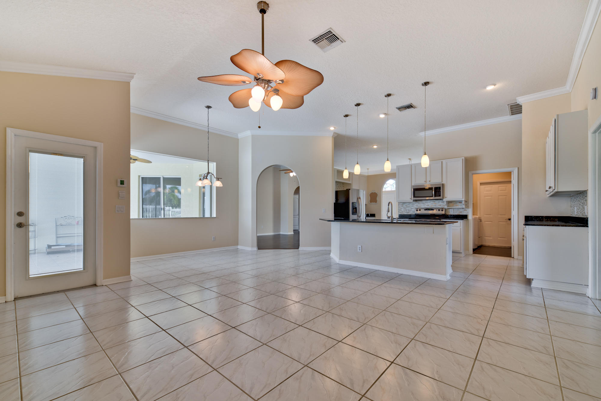 567 Southwest Spring Hill Point Port St. Lucie, FL 34986 - Photo 11 of 36 a view of kitchen and window