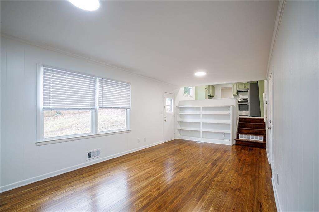 2692 Whites Mill Court Decatur, GA 30034 - Photo 14 of 33 a room with a furniture and a window