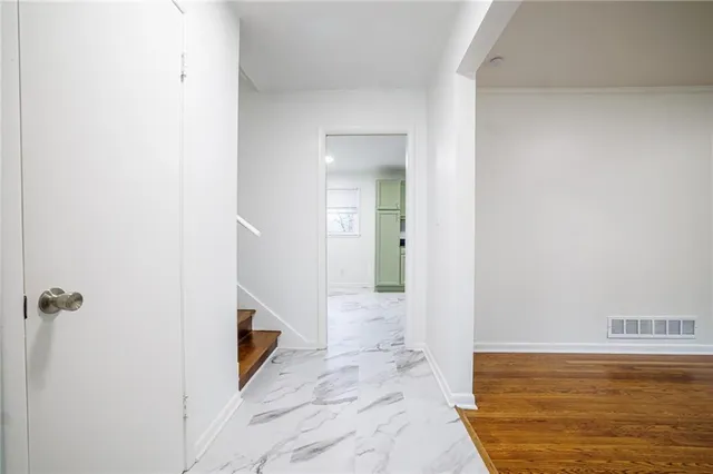 a view of a bathroom from the hallway