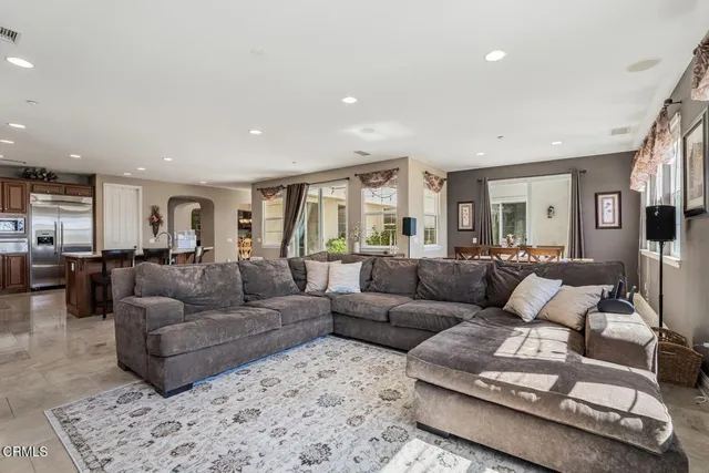 a living room with furniture and a couch