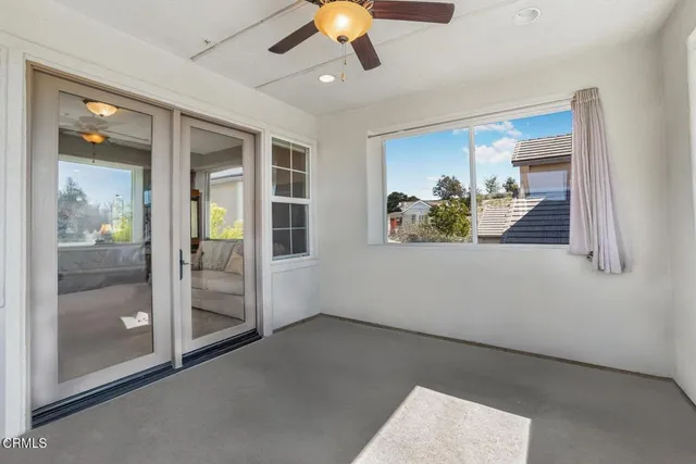 a view of an empty room and window