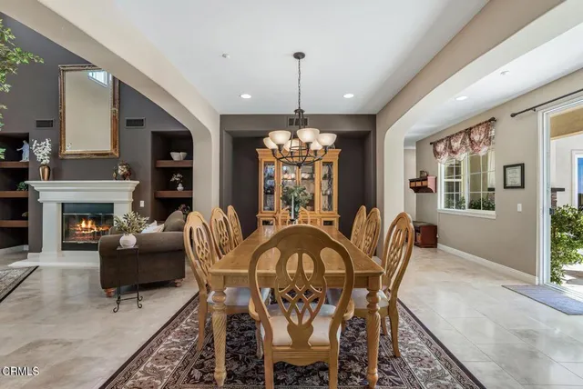 a view of a livingroom with furniture window and wooden floor