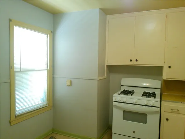 a view of storage and utility room with washer and dryer