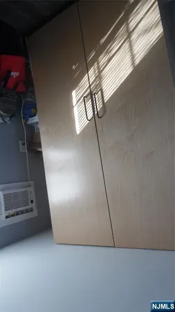 a view of an empty room with stairs