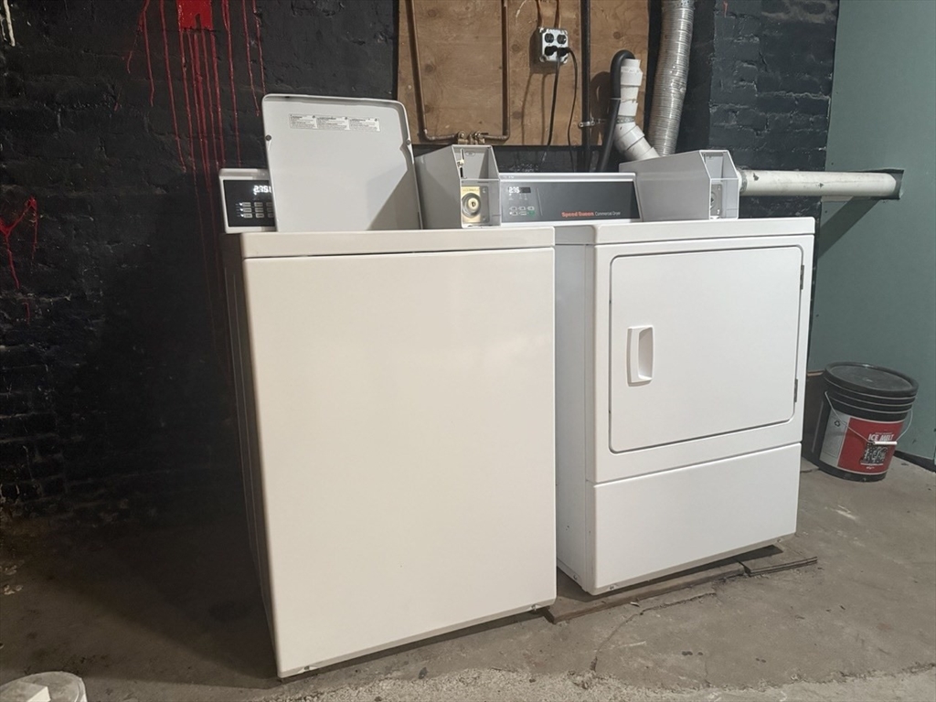 11 Vancouver Street, Unit 2 Boston, MA 02115 - Photo 11 of 14 a utility room with dryer and washer