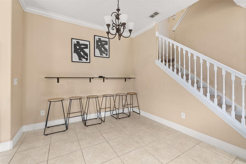 811 Assembly Court Reunion, FL 34747 - Photo 11 of 84 a view of staircase with white walls and white walls