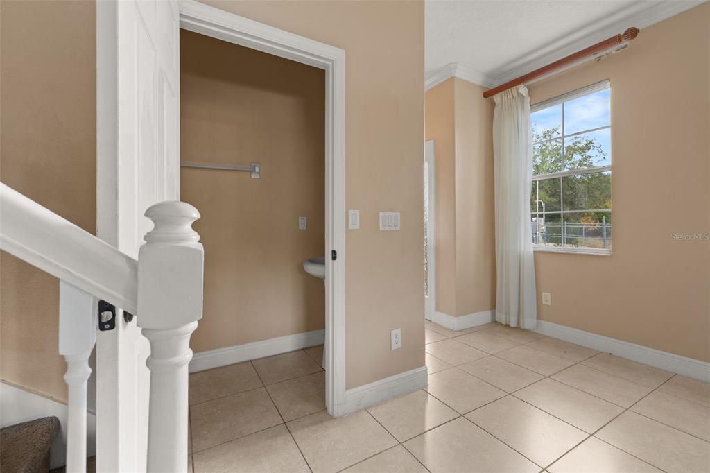 811 Assembly Court Reunion, FL 34747 - Photo 20 of 84 a view of an entryway and livingroom in right side