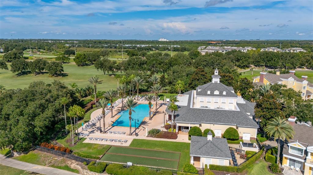 811 Assembly Court Reunion, FL 34747 - Photo 52 of 84 an aerial view of a house with a garden