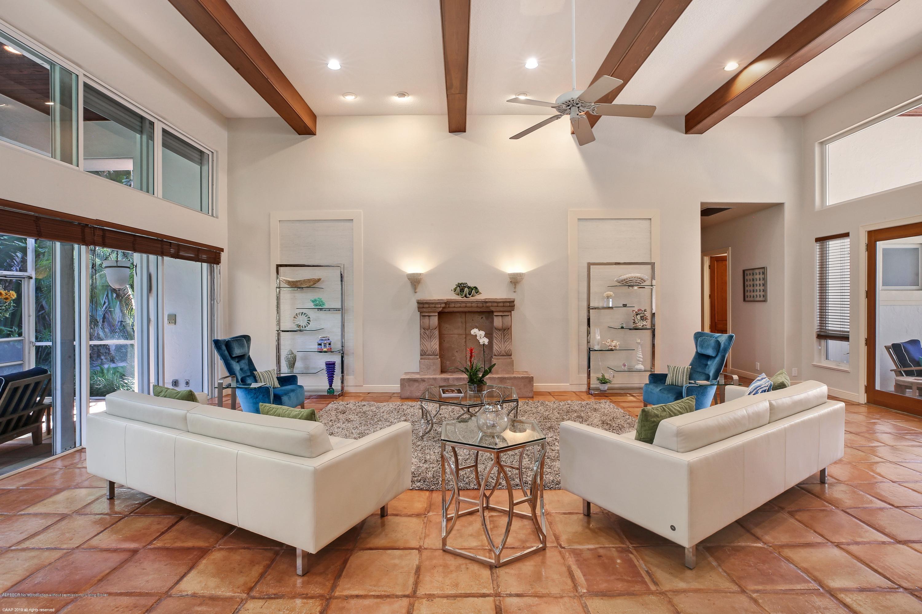 210 Wells Road Palm Beach, FL 33480 - Photo 13 of 65 a living room with furniture and a large window