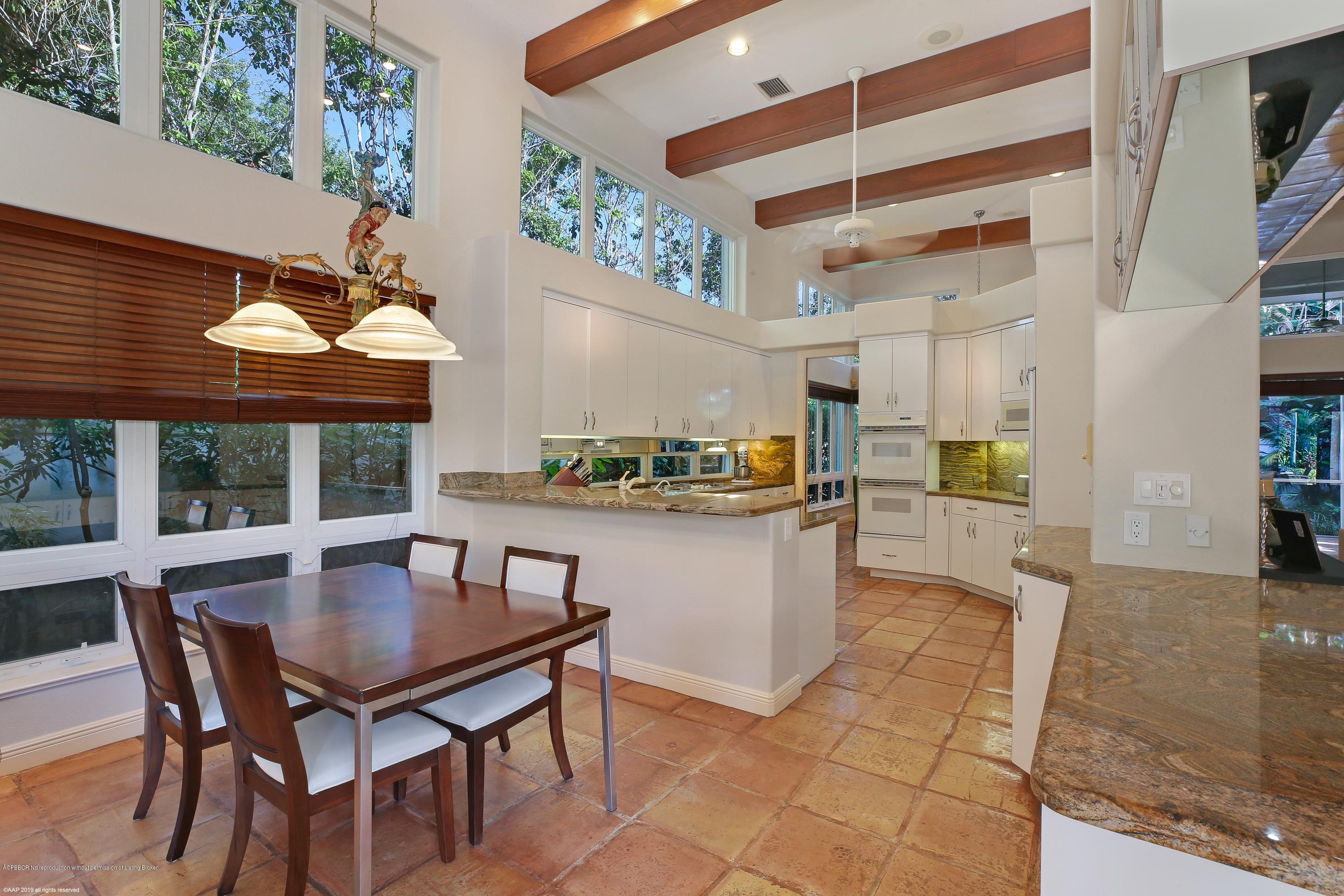 210 Wells Road Palm Beach, FL 33480 - Photo 17 of 65 a view of a dining room with furniture window and outside view