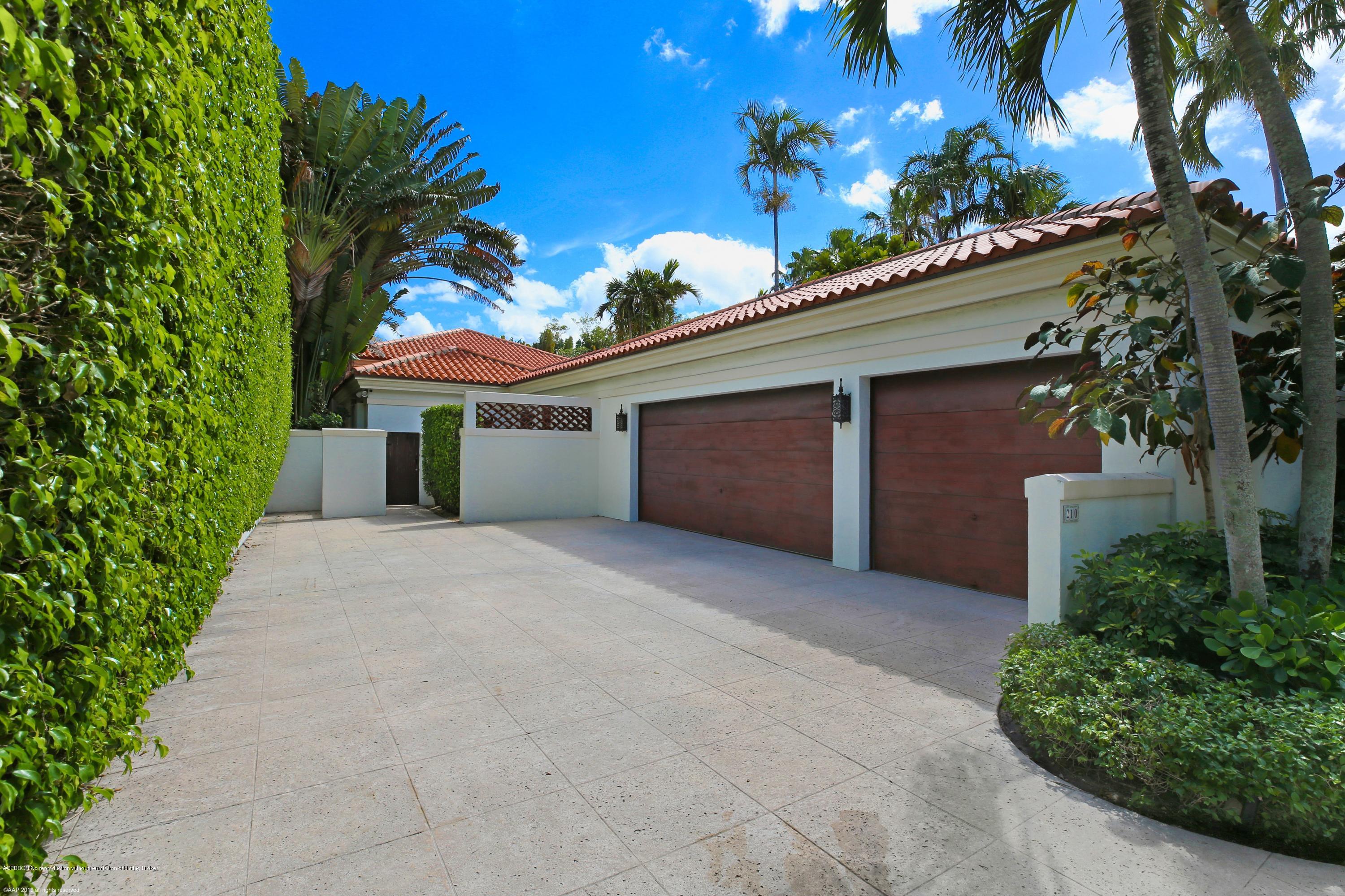 210 Wells Road Palm Beach, FL 33480 - Photo 35 of 65 front view of a house with a garage