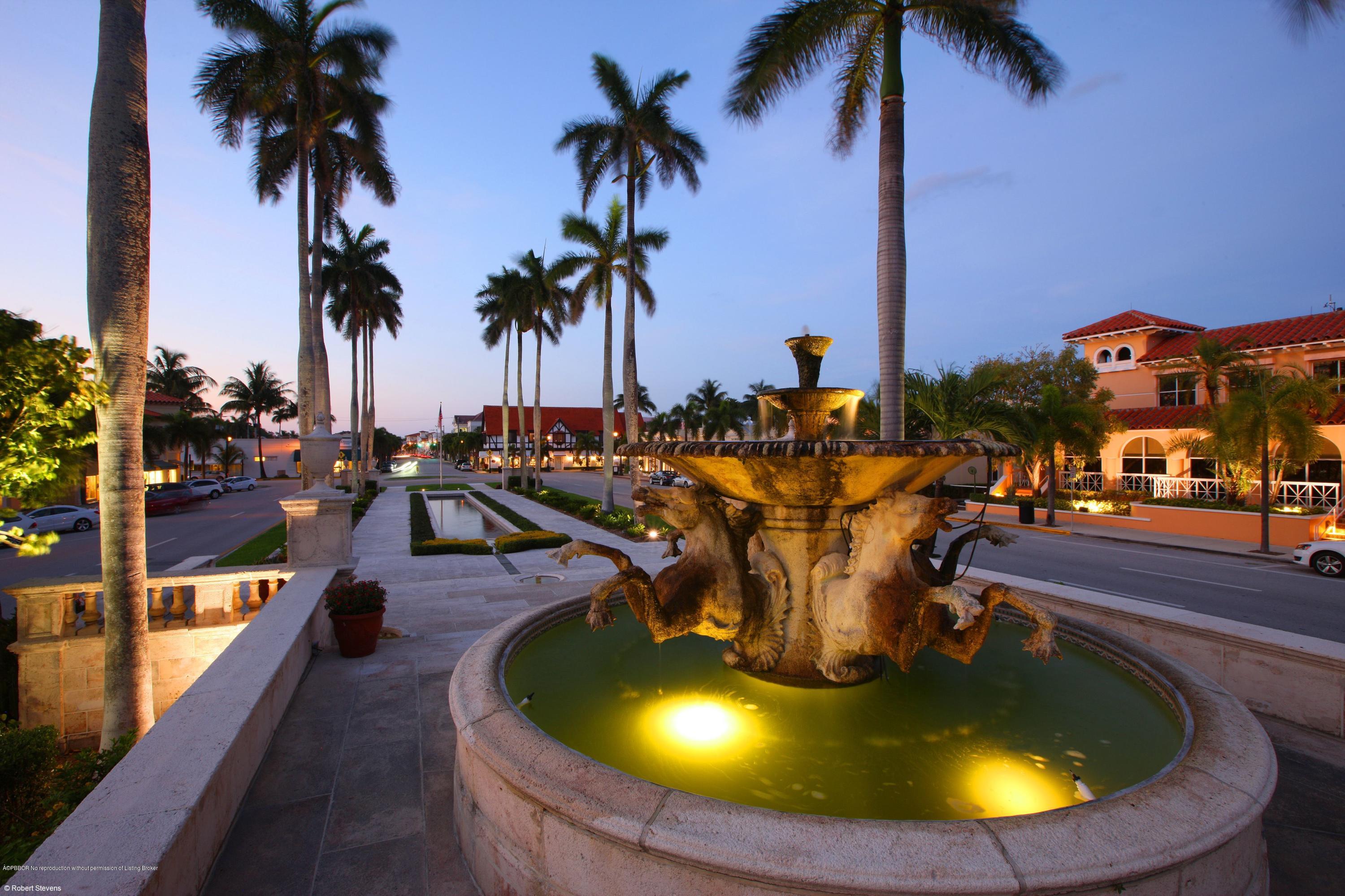 210 Wells Road Palm Beach, FL 33480 - Photo 43 of 65 a view of a swimming pool with chairs