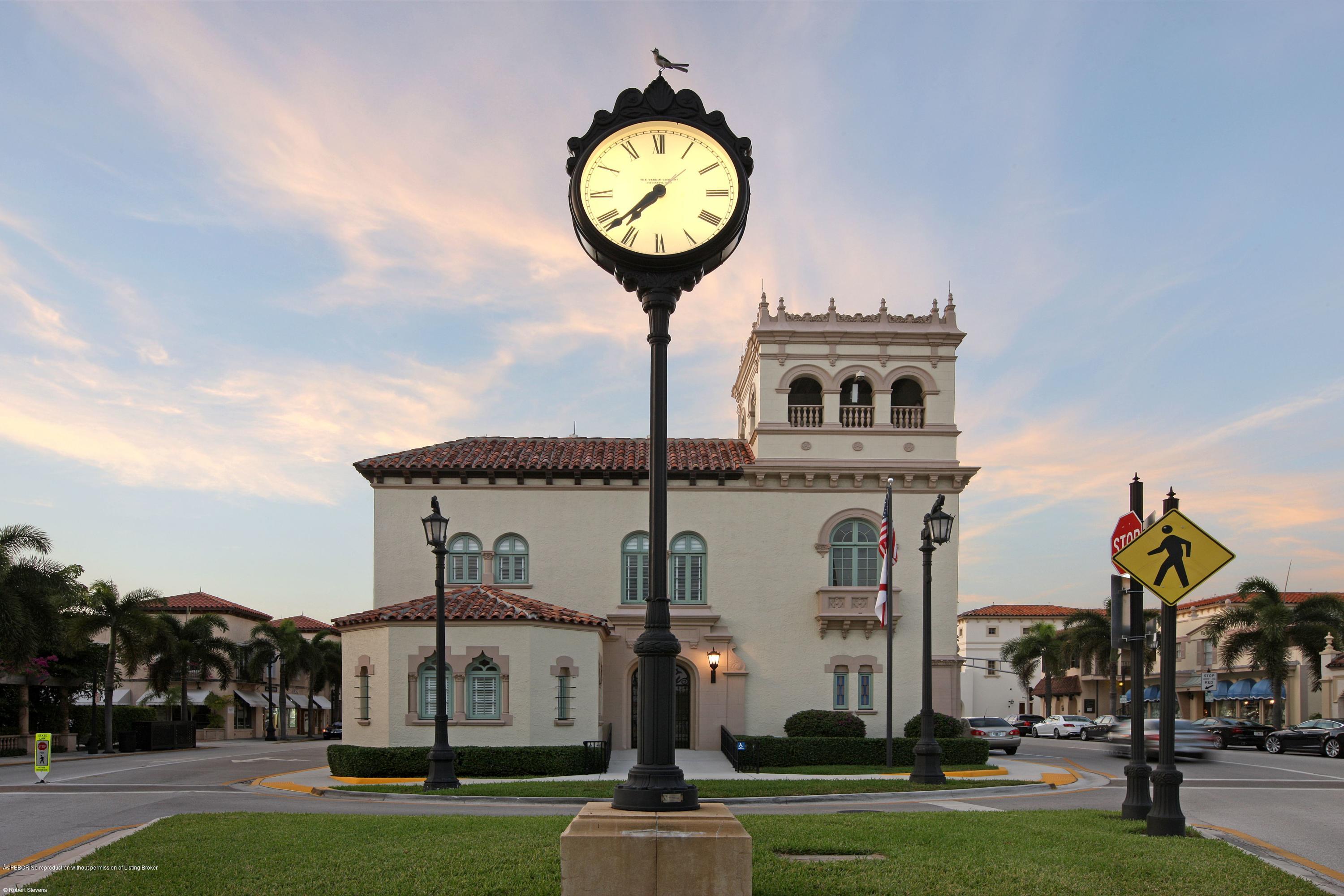 210 Wells Road Palm Beach, FL 33480 - Photo 45 of 65 a view of a building with a swimming pool