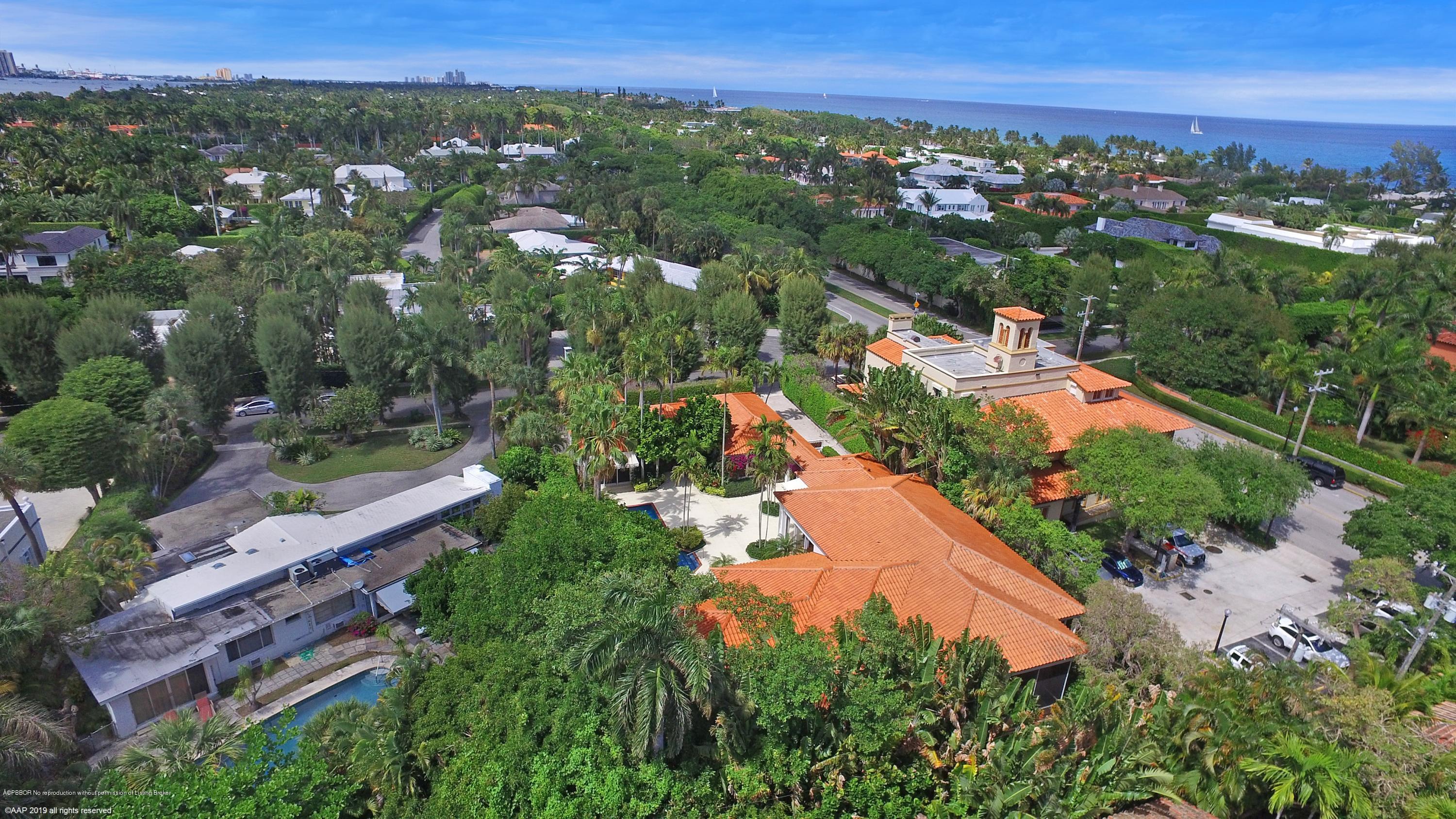 210 Wells Road Palm Beach, FL 33480 - Photo 52 of 65 an aerial view of residential houses with outdoor space and trees
