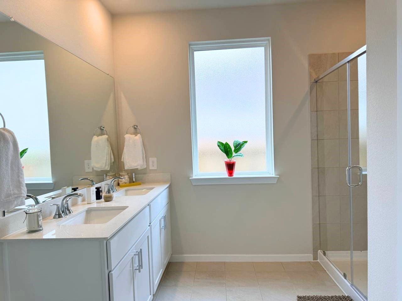 16246 Parish Pointe Court Conroe, TX 77302 - Photo 24 of 32 a bathroom with a sink a vanity and a mirror
