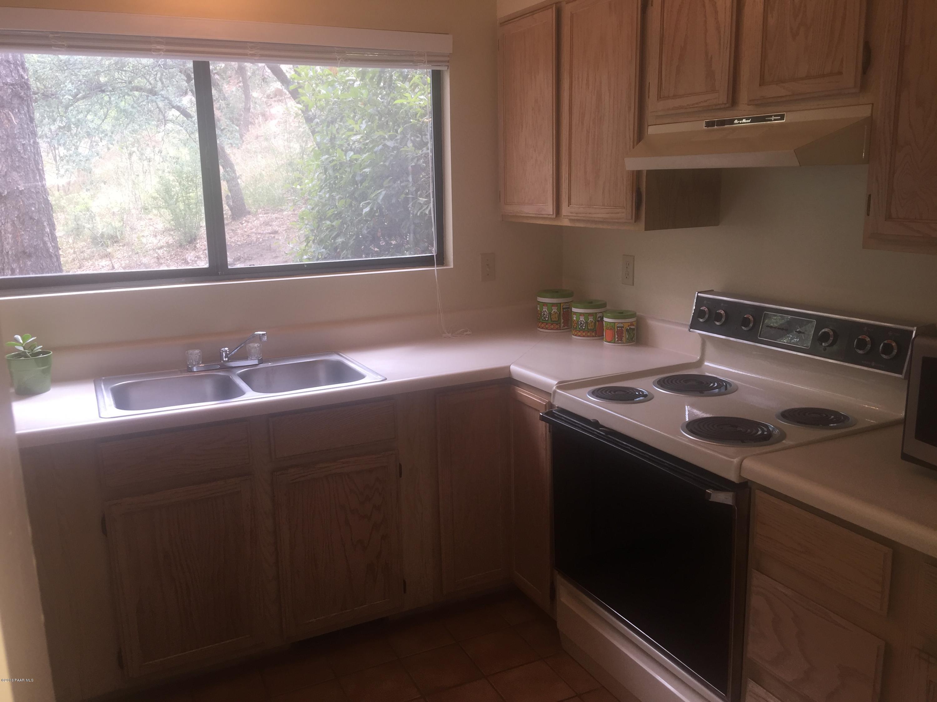 901 Old Stage Road, Unit 6D Prescott, AZ 86303 - Photo 3 of 33 Kitchen w/view of forest