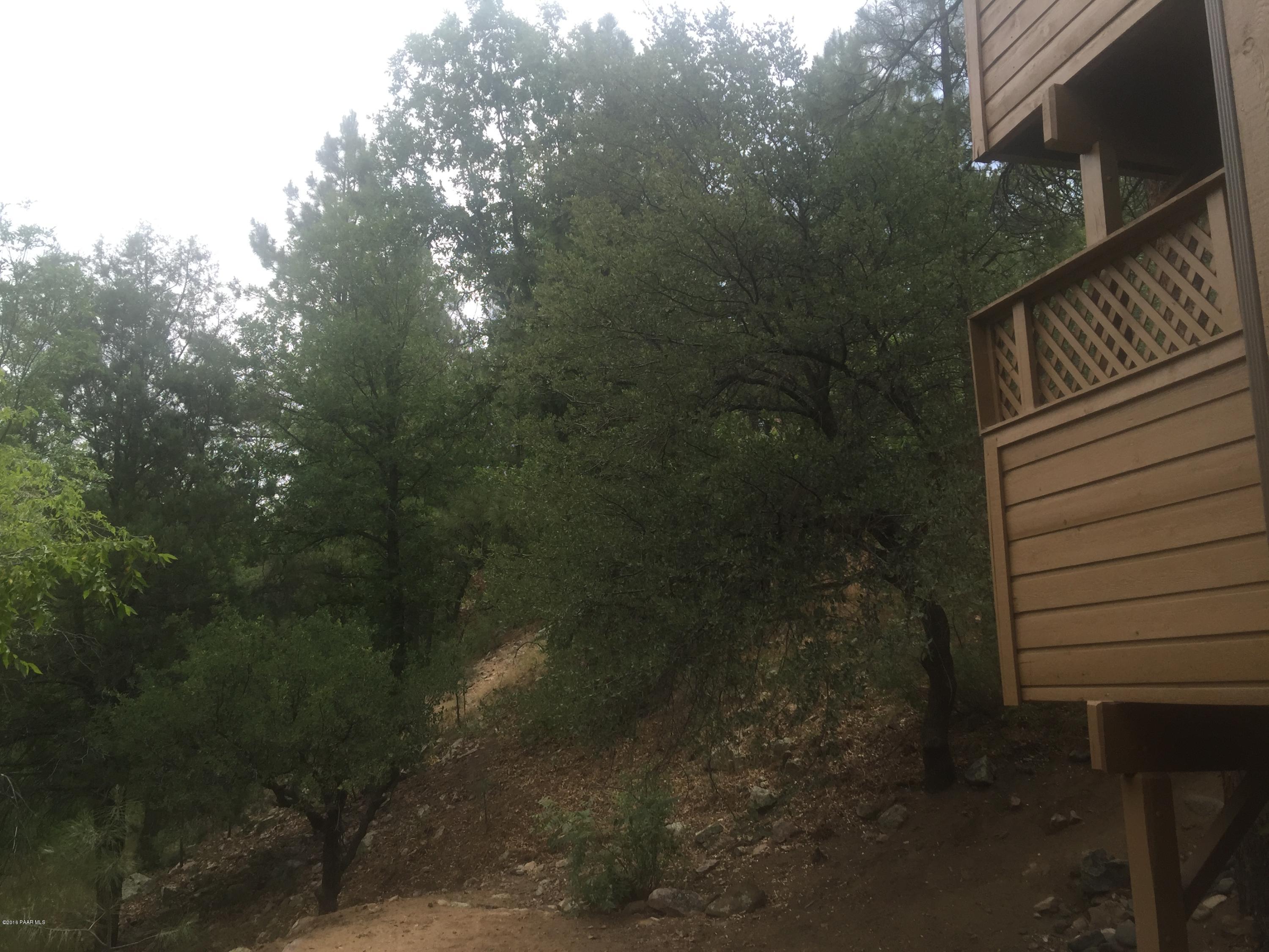 901 Old Stage Road, Unit 6D Prescott, AZ 86303 - Photo 33 of 33 Nothing but trees to see off Deck
