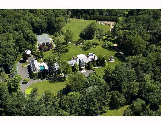 Undisclosed Address Greenwich, CT 06830 - Photo 1 of 1 a view of a lake and green field