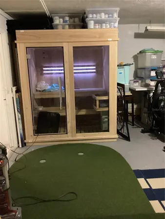 a view of entryway with wooden floor and stairs