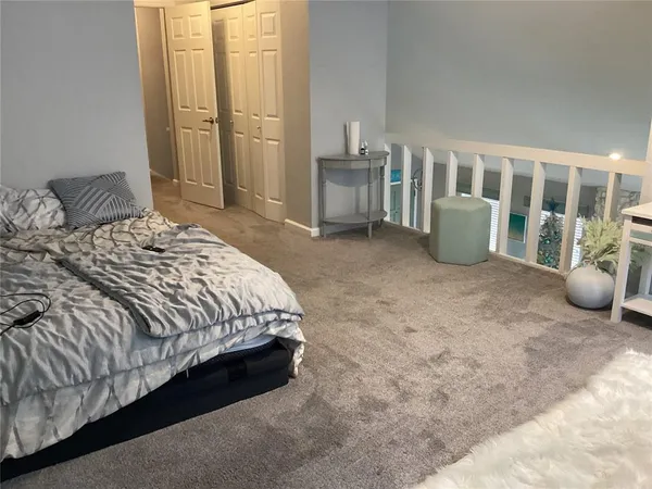 a view of a backyard with pathway