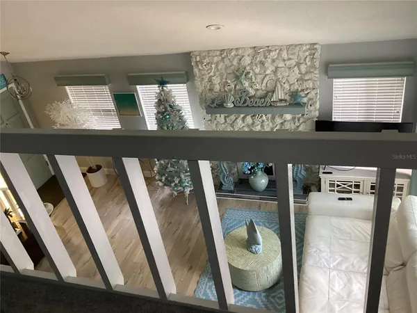 a view of a chairs and table in backyard