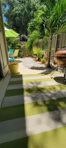 a view of entryway with wooden floor and stairs