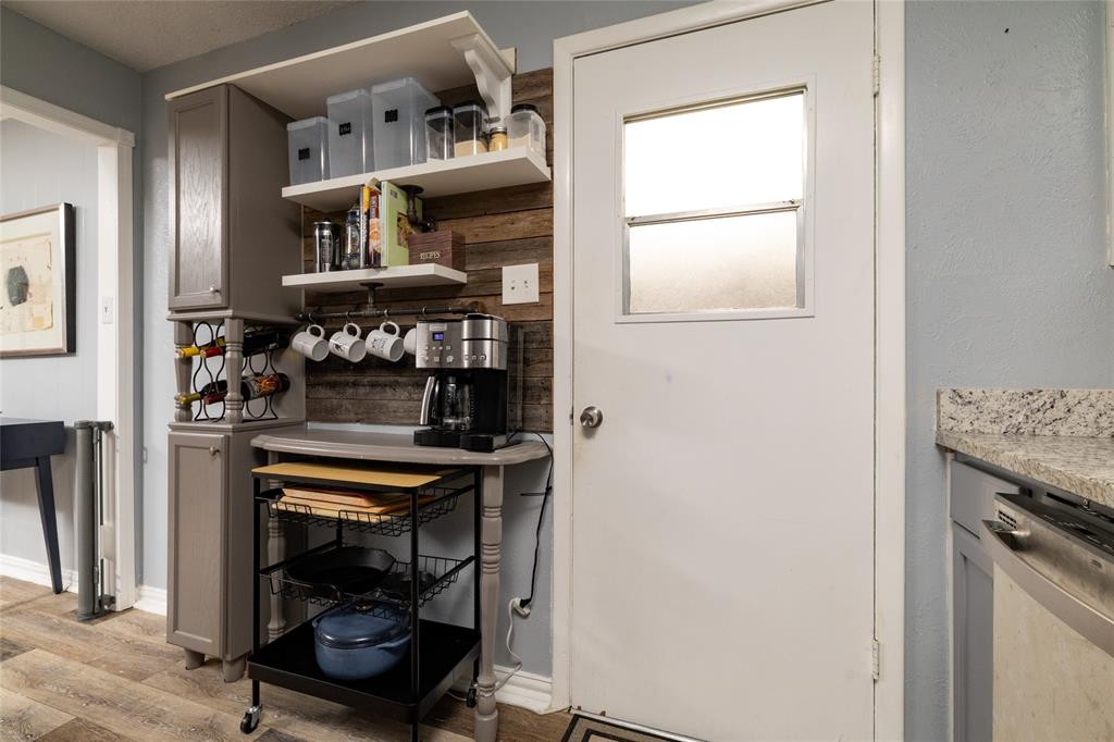 6020 Harrison Way Watauga, TX 76148 - Photo 17 of 32 a view of kitchen and utility room