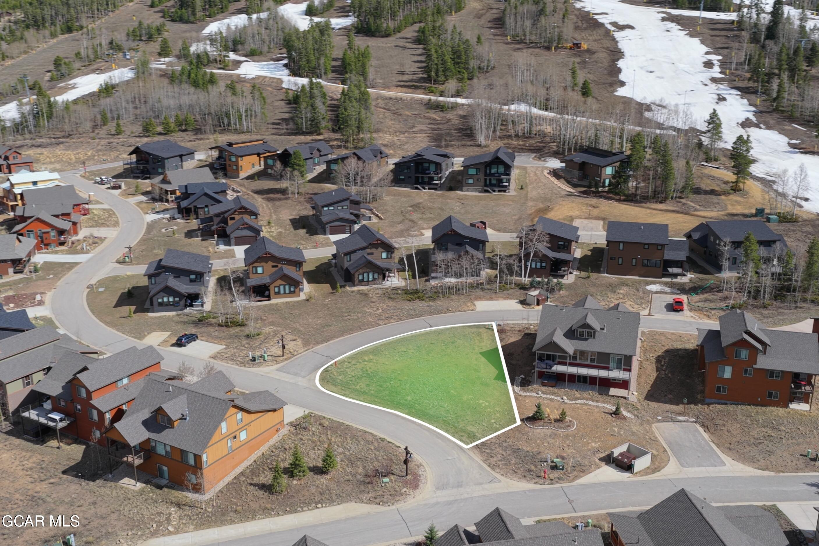 500 Powder Court Granby, CO 80446 - Photo 2 of 12 an aerial view of a house with a swimming pool