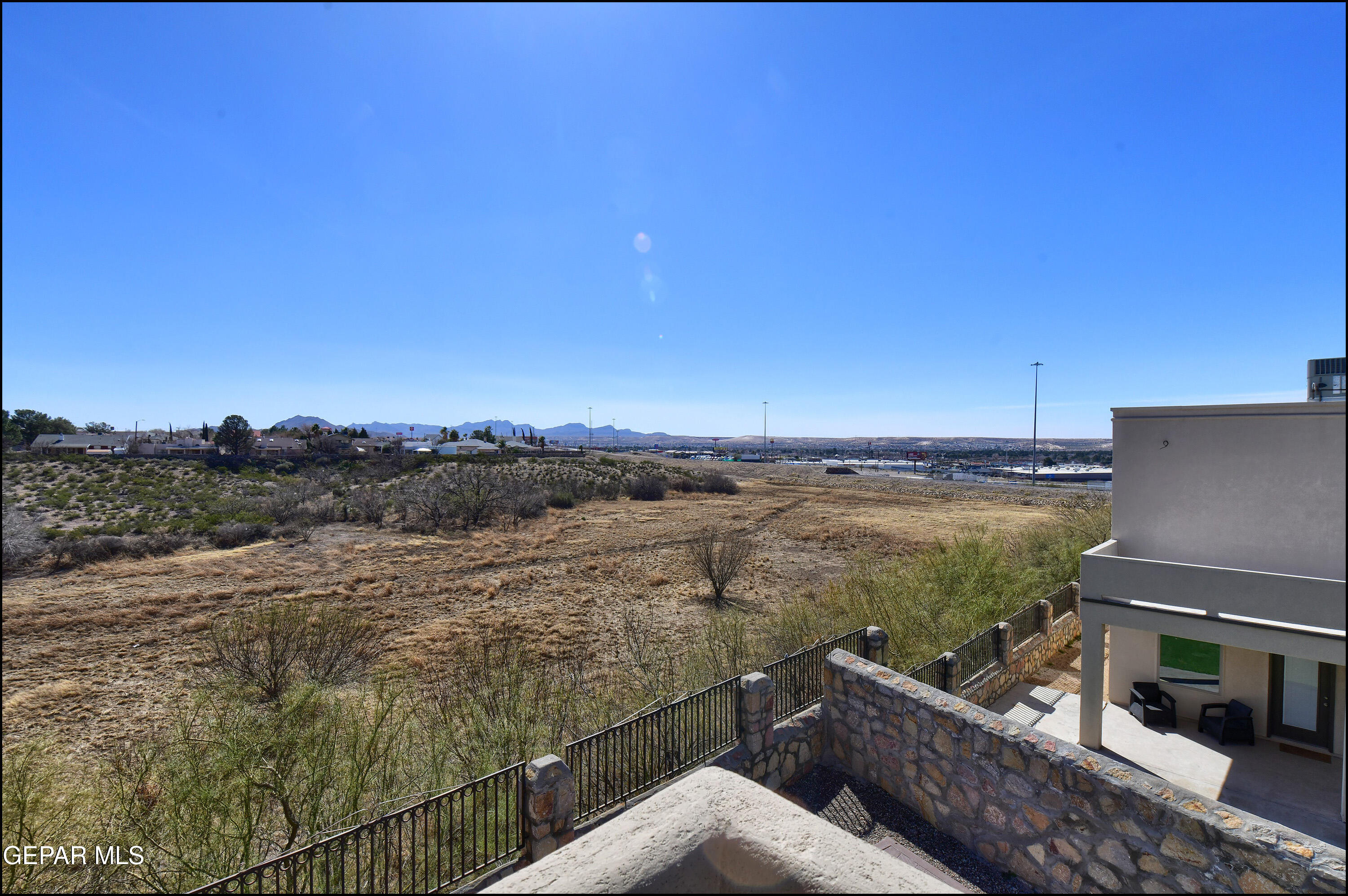 401 Ana Way, Unit B El Paso, TX 79912 - Photo 31 of 54 a view of a terrace with a lake view