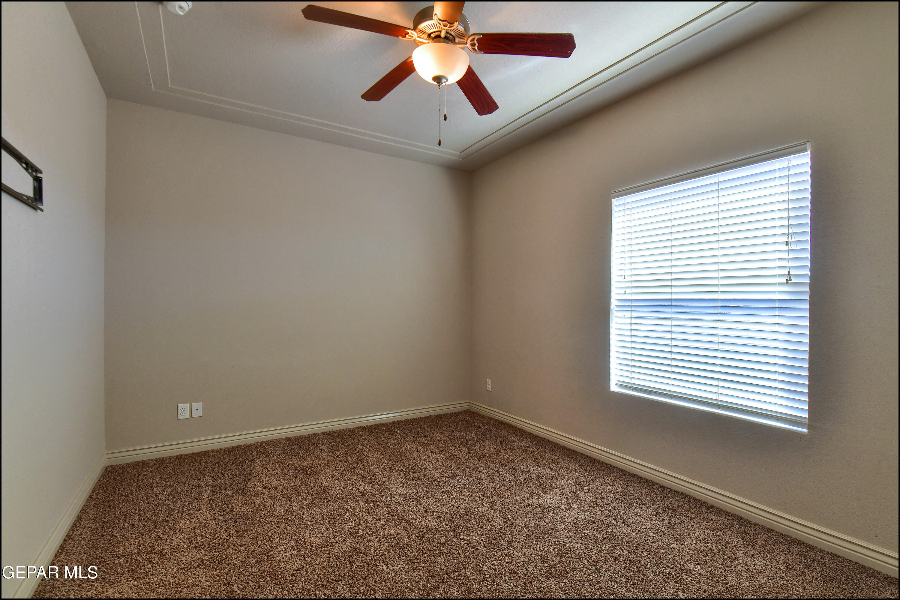 401 Ana Way, Unit B El Paso, TX 79912 - Photo 33 of 54 an empty room with a window