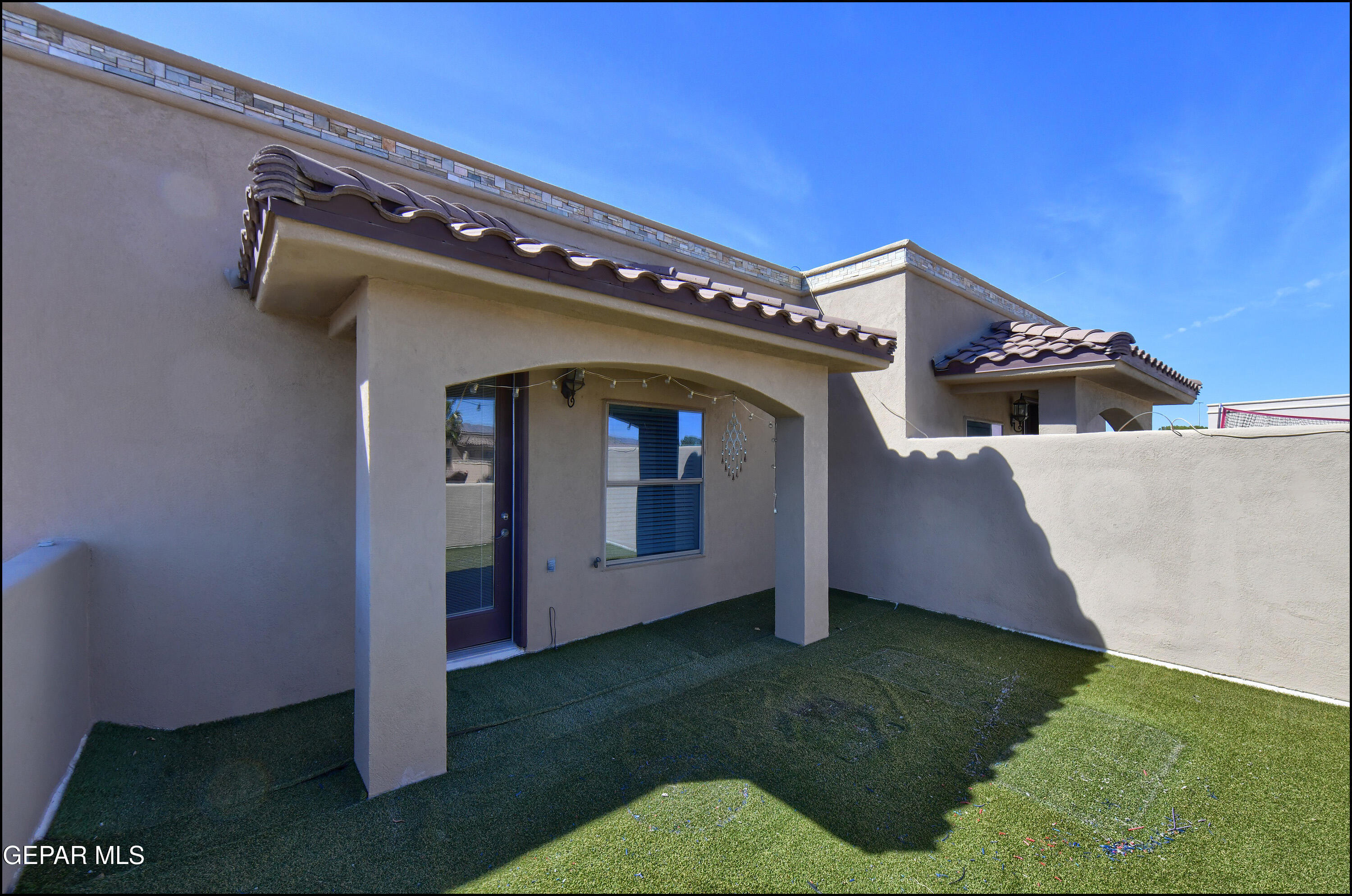 401 Ana Way, Unit B El Paso, TX 79912 - Photo 39 of 54 a front view of a house with garden