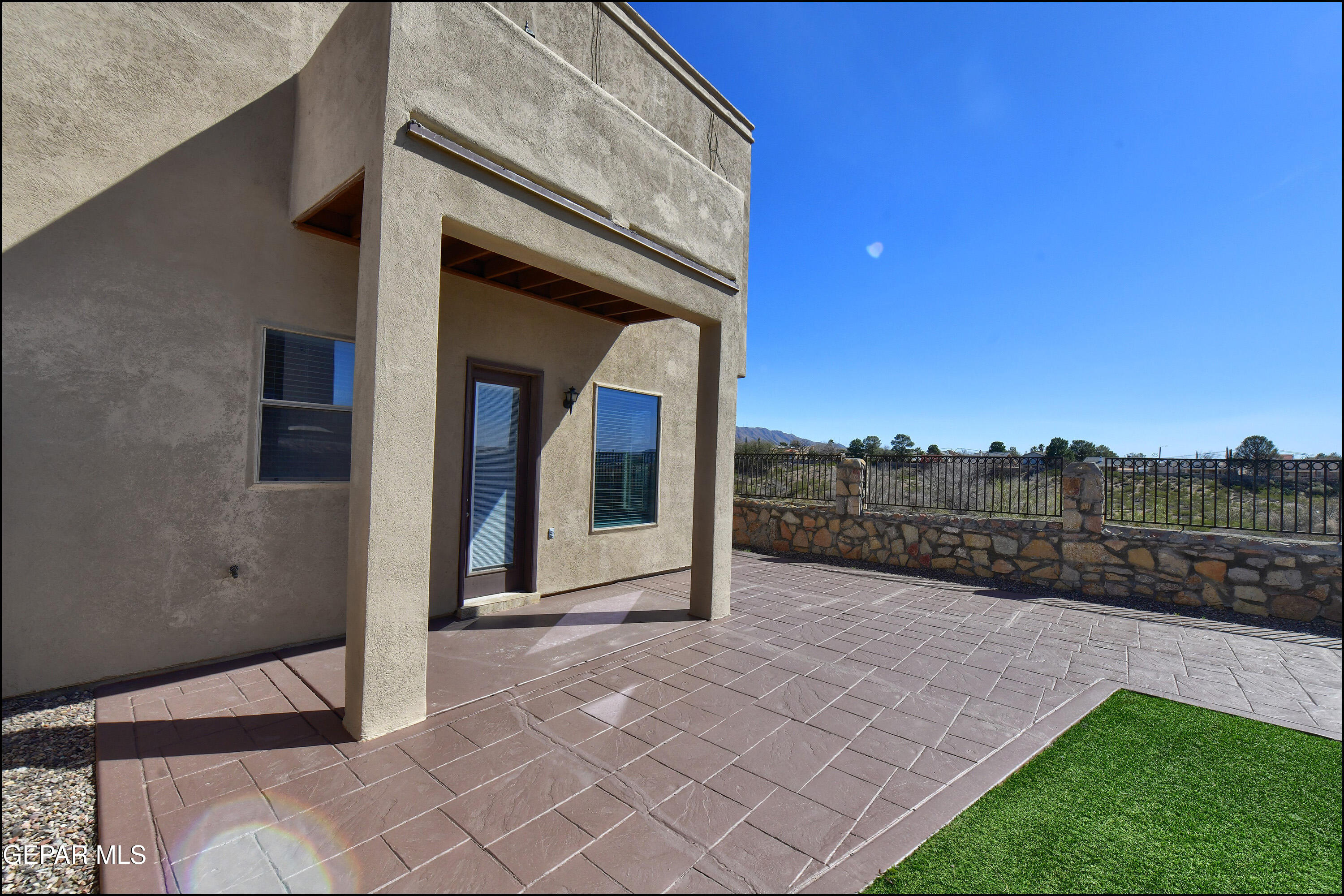 401 Ana Way, Unit B El Paso, TX 79912 - Photo 47 of 54 a view of a house with a small porch