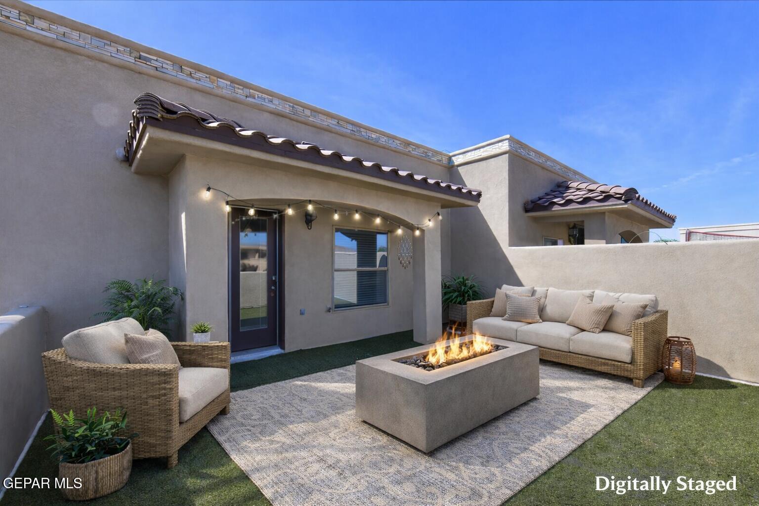 401 Ana Way, Unit B El Paso, TX 79912 - Photo 54 of 54 a living room with furniture and a large window