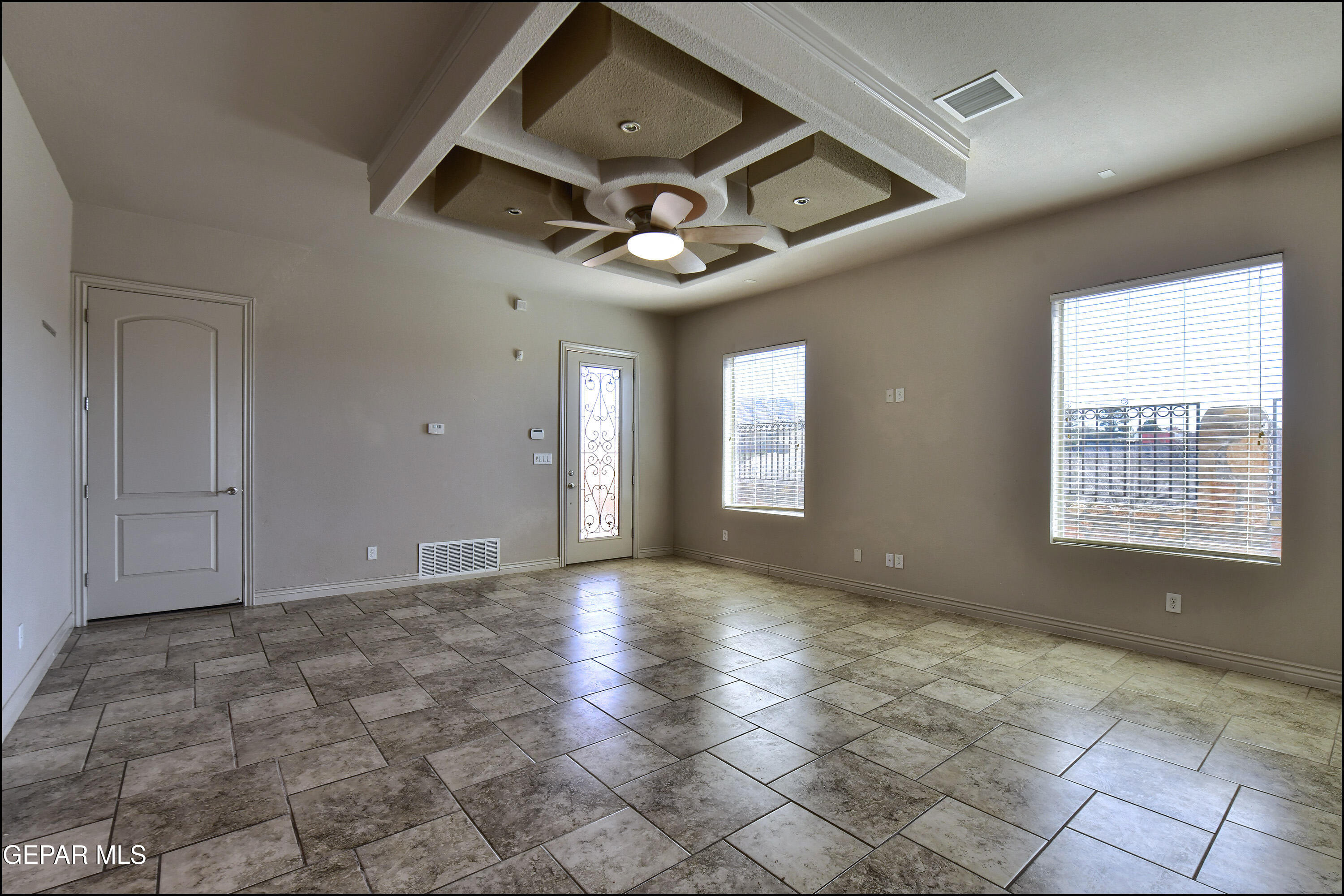 401 Ana Way, Unit B El Paso, TX 79912 - Photo 8 of 54 a view of an empty room and window