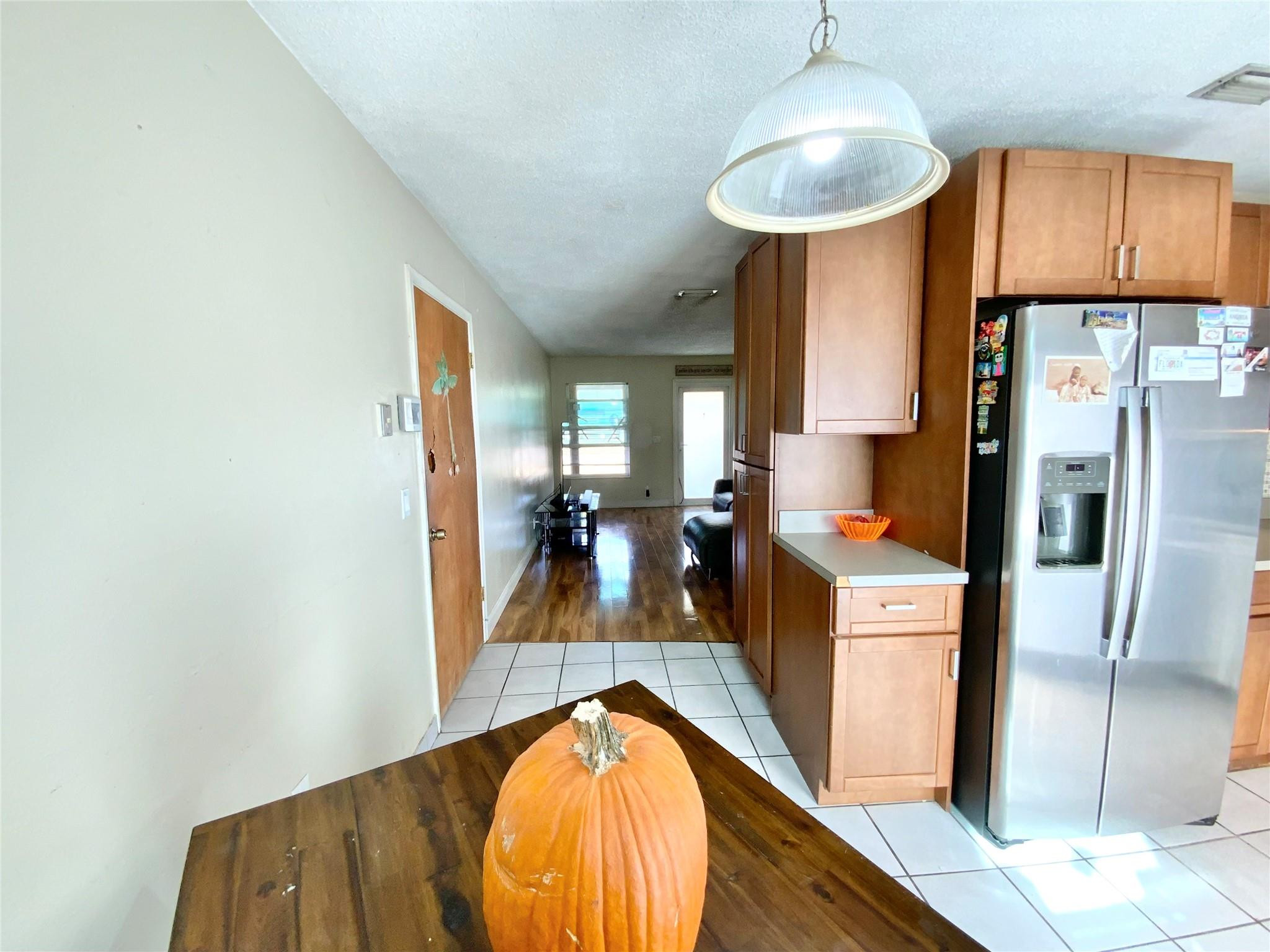 8160 Southwest 6th Street North Lauderdale, FL 33068 - Photo 15 of 39 a view of a kitchen with a sink and a refrigerator