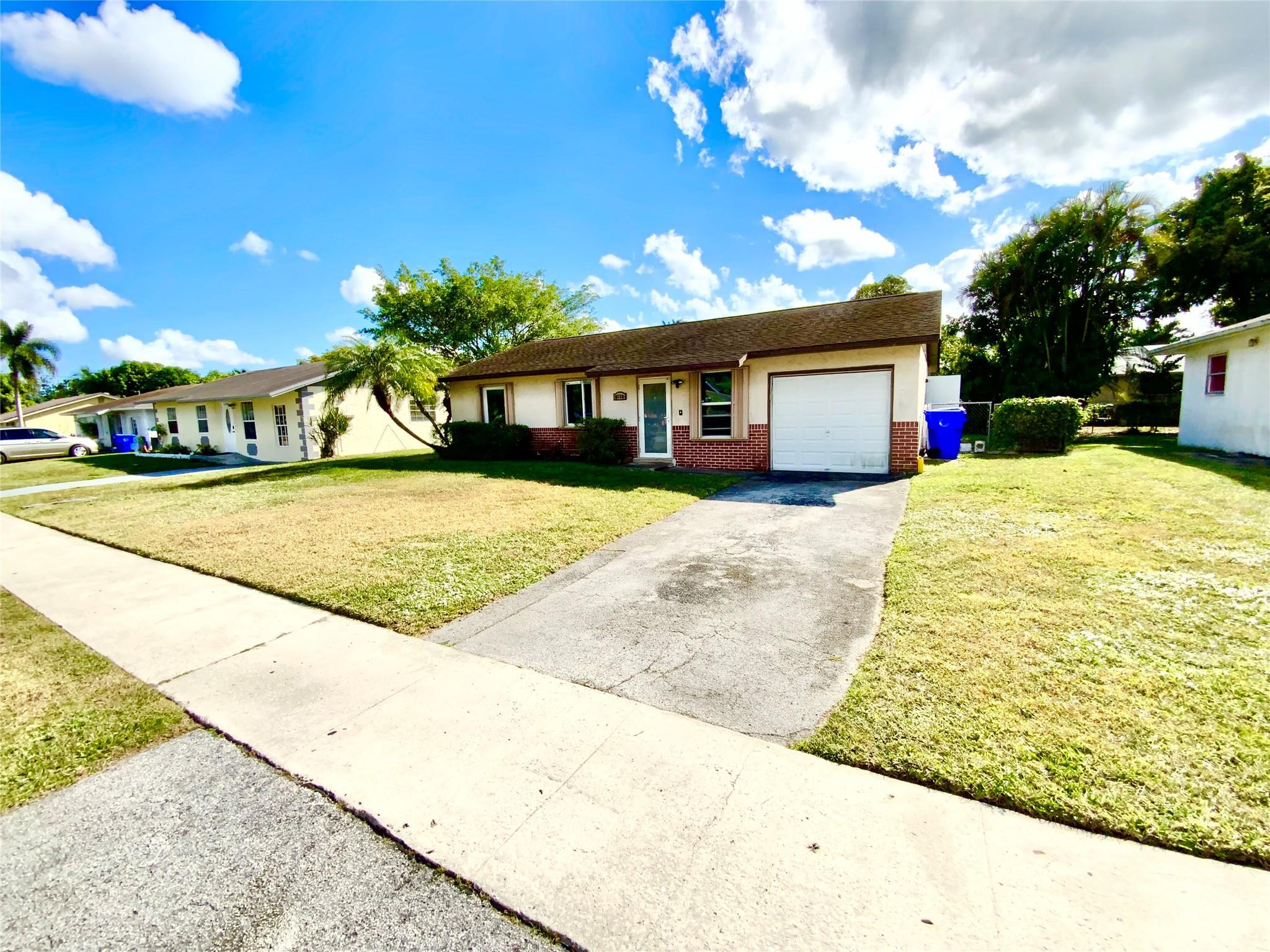 8160 Southwest 6th Street North Lauderdale, FL 33068 - Photo 3 of 39 a view of a house with a patio