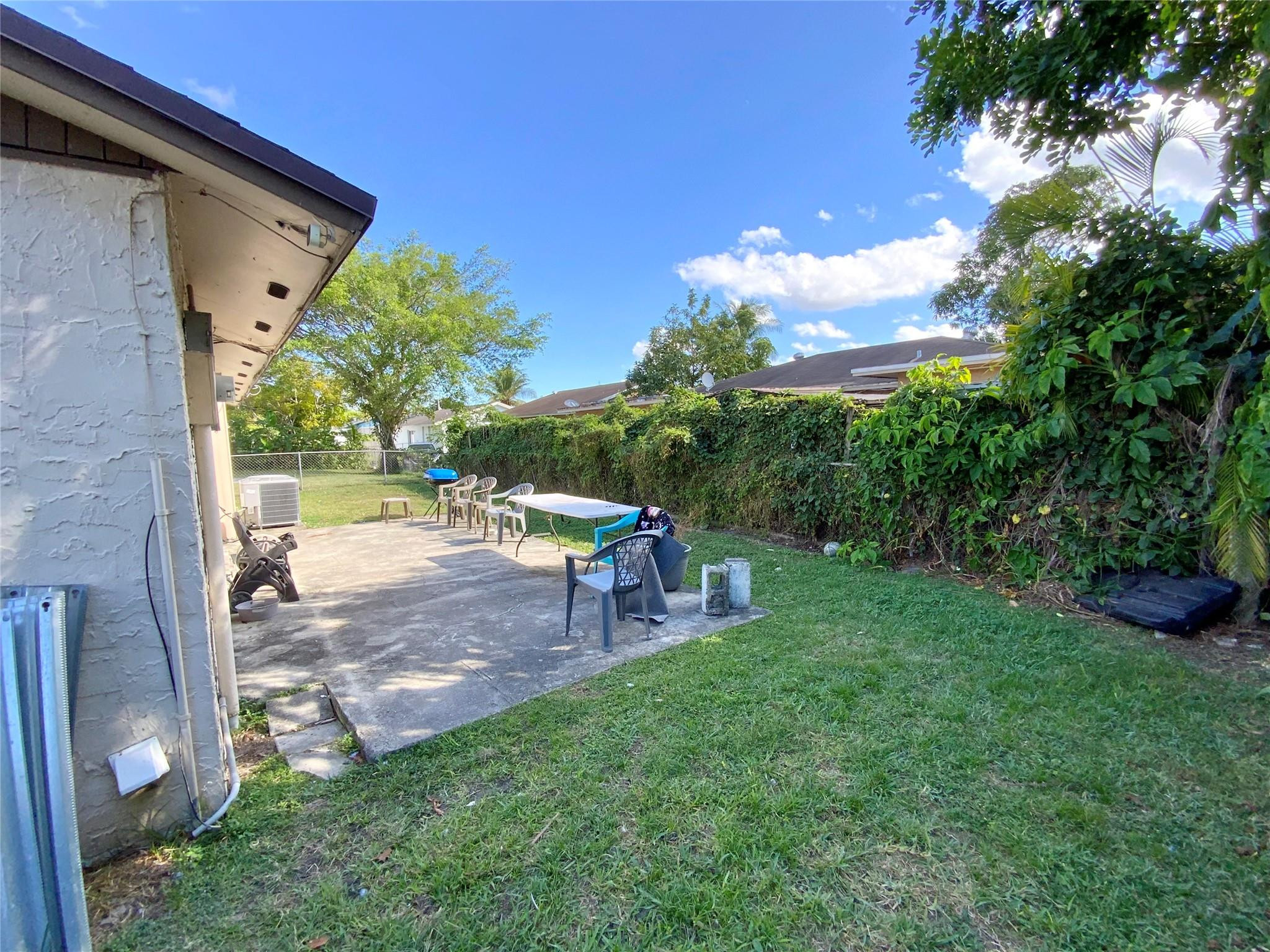 8160 Southwest 6th Street North Lauderdale, FL 33068 - Photo 36 of 39 a view of yard with patio