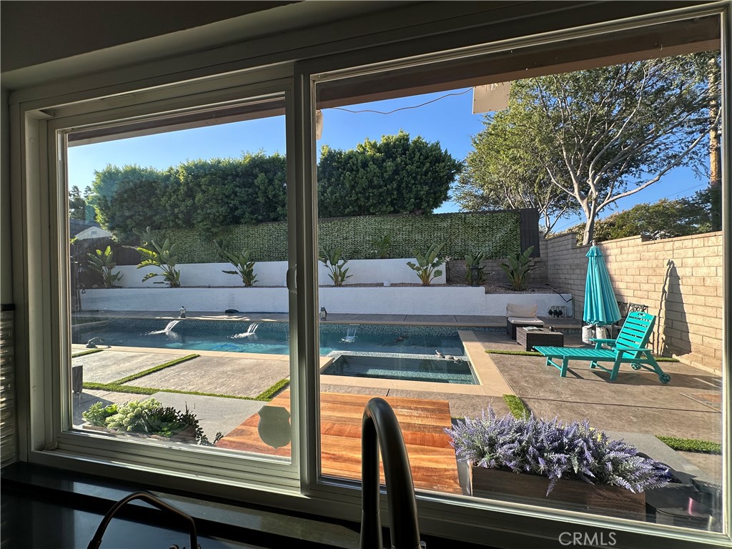 13191 Honeybee Street Moorpark, CA 93021 - Photo 16 of 27 a view of a porch and bench