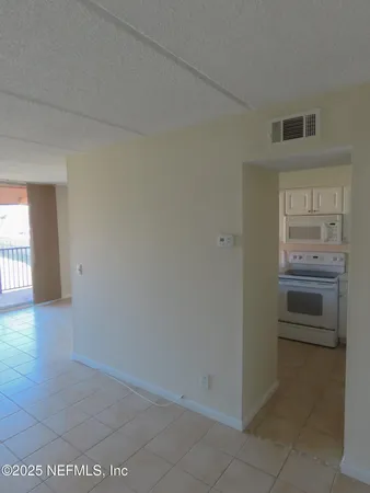 a bathroom with a tub and shower