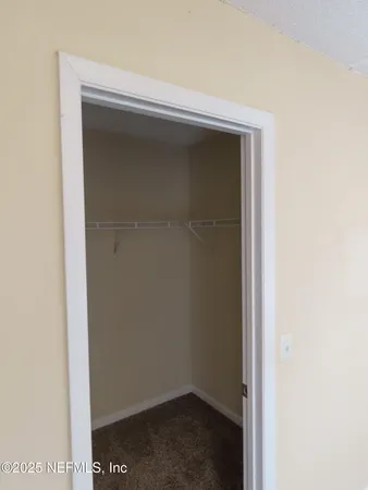 a view of balcony with furniture