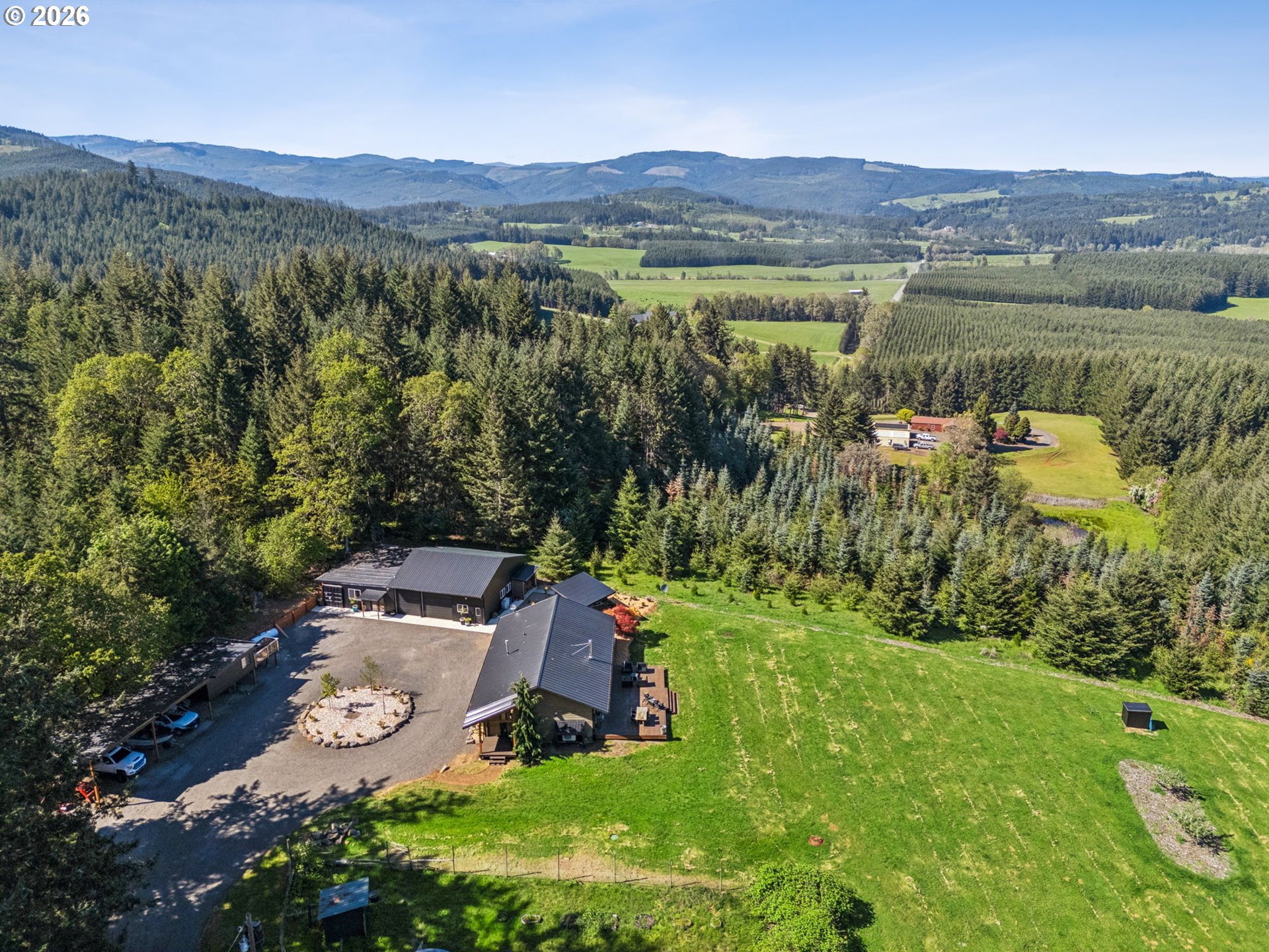 18600 Northwest Meadowlake Road Yamhill, OR 97148 - Photo 42 of 47 an aerial view of a houses with a yard