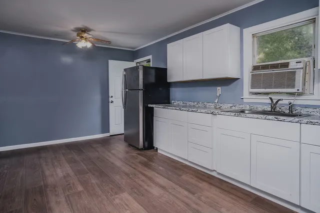 a view of a hallway with washer and dryer