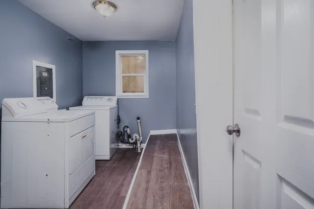 a view of field with trees in the background